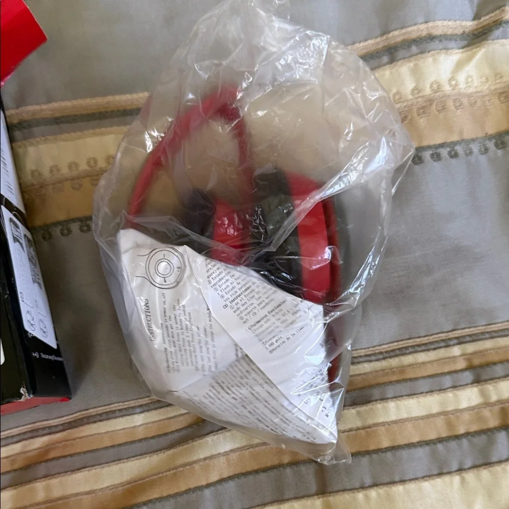 Red Wireless Headphones P47 new with box box has some damage